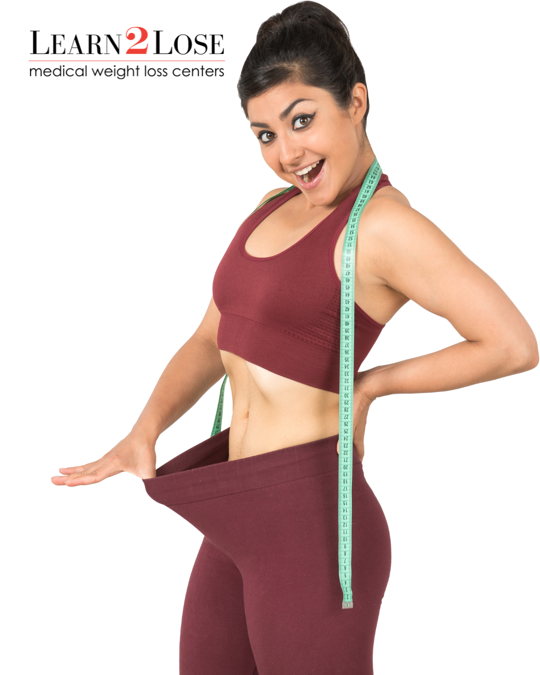 smiling latina woman wearing workout attire at Charlotte's Best Weight Loss Centers